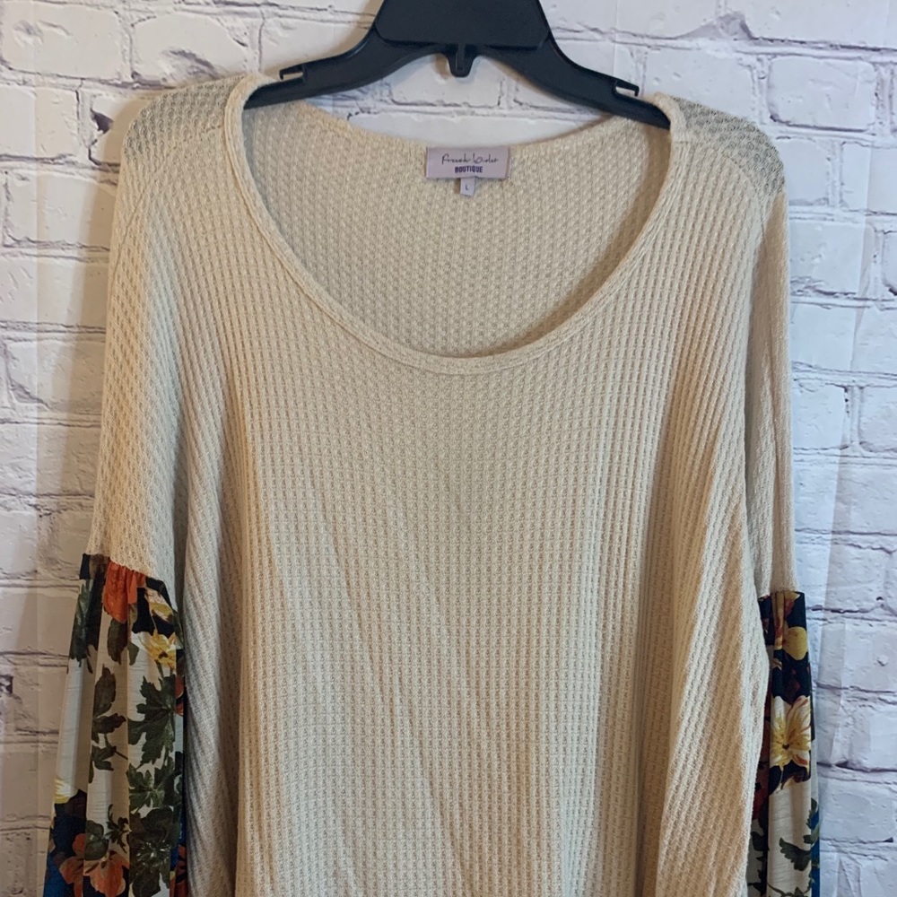 EUC waffle knit top with patterned sleeves